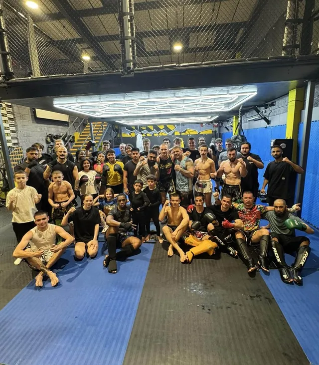 A full class of adults and juniors at the gym